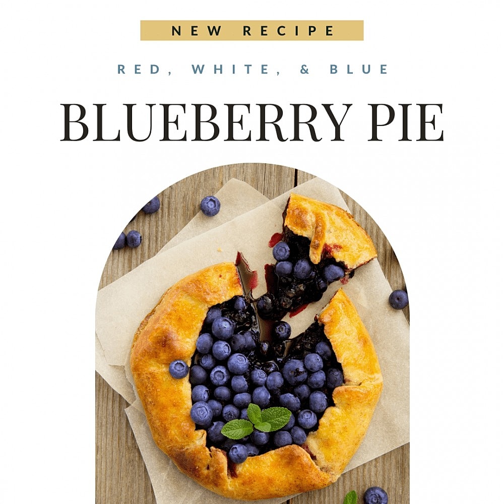 Blueberry pie with fresh blueberries and mint.